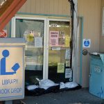 The Flagler Beach library, seen here in the aftermath of Hurricane Irma in 2017, has had it rough for the past few years, but has remained open more than not, one way or another. It reopens its doors to in-person browsing Tuesday. (© FlaglerLive)