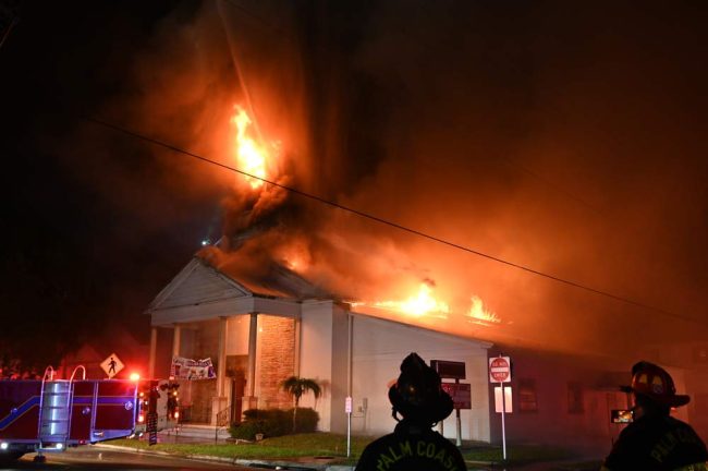 The Flagler Playhouse in flames around midnight. The fire had been burning two hours. (© FlaglerLive)
