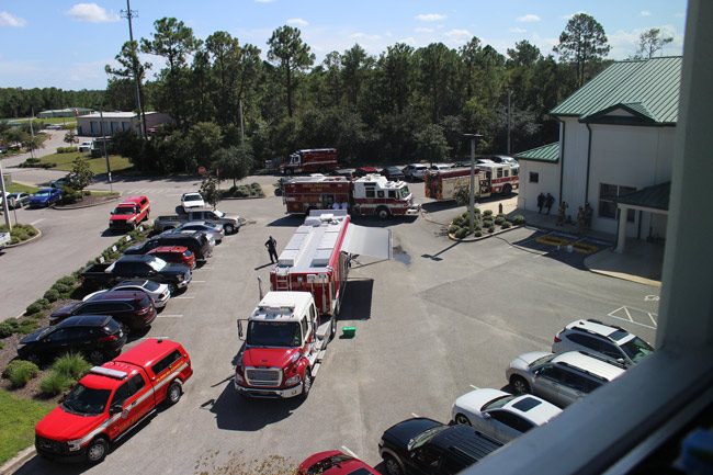 Emergency vehicles in the Government Services Building's parking lot this afternoon. (Flagler County)