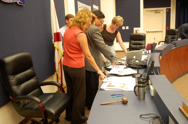 From foreground, Flagler County School Board members Colleen Conklin, Andy Dance and Sue Dickinson, with Trevor Tucker half-hidden. (© FlaglerLive)