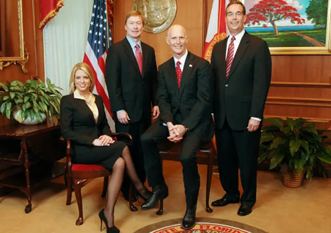 Don't believe their hype. The Florida Cabinet, from left: Pam Bondi, Adam Putnam, Rick Scott and Jeff Atwater. 
