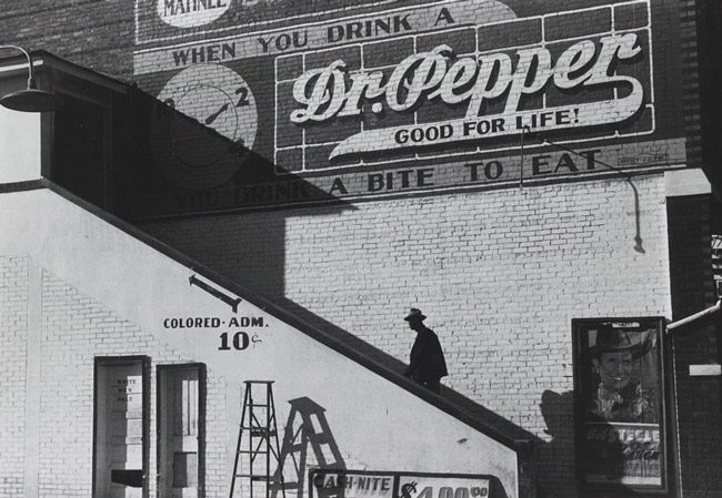 Florida has a hankering for bad old days: a black man steps up to the 'colored' section of a movie house. (Library of Congress)