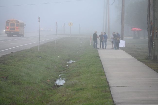 Before the protest on the sidewalk in front of FPC. (© FlaglerLive)