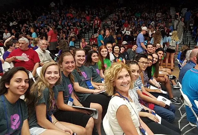 Teacher Diane Tomko in the foreground and the Flagler Palm Coast High School Future Problem Solvers contingent at the closing ceremonies of this year's Future Problem Solving International competition in Lacrosse, Wis., Sunday. (FPS/Facebook)