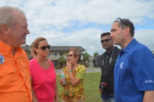 FPL Vice President Robert Gould, right, this morning in Flagler Beach, speaking with, from left, Flagler Beach City Manager Larry Newsom, Flagler Beach Mayor Linda Provencher, and Flagler Beach City Commission Chairman Jane Mealy. The man next to Gould was not identified. Click on the image for larger view. (c FlaglerLive)