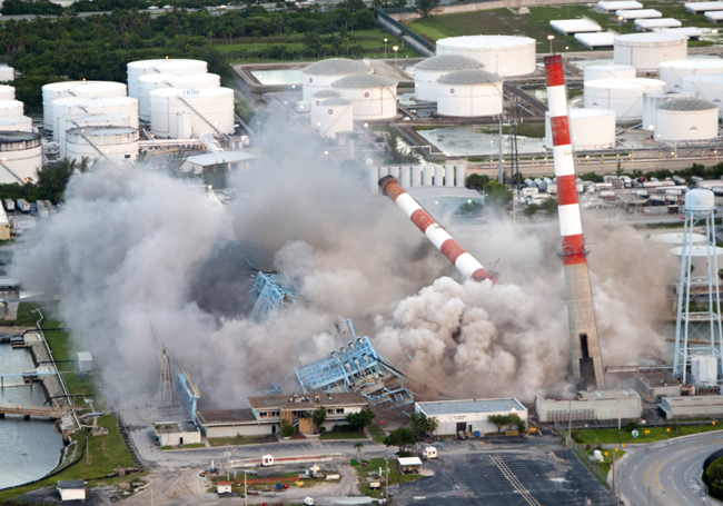 Florida Power & Light in July demolished its 1960s-era Port Everglades Power Plant in Hollywood, Fla., to make way for a new, clean energy center powered by natural gas. The demolition of four 350-foot, candy-cane-striped stacks and four 7,500-ton boilers – a staple of South Florida's skyline for more than 50 years – occurred shortly after sunrise, launching a new era for FPL customers and South Florida. (FPL)