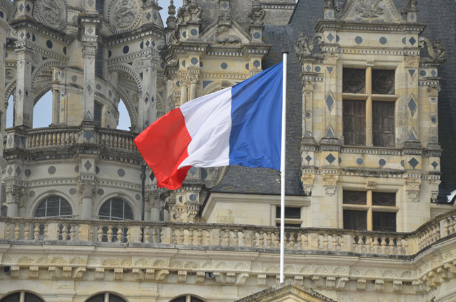 With Emmanuel Macron's election as the eight president of France's Fifth Republic Sunday, democracy survived a challenge by the National Front's Marine Le Pen, who, until the end, signaled her contempt for the nation's institutions by forbidding certain journalists from attending her election night rally. (© FlaglerLive)