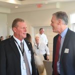 Circuit Judge Chris France, left, speaking with ex-US Attorney Roger Handberg shortly before Handberg's talk to Flagler Tiger Bay Wednesday. (© FlaglerLive)