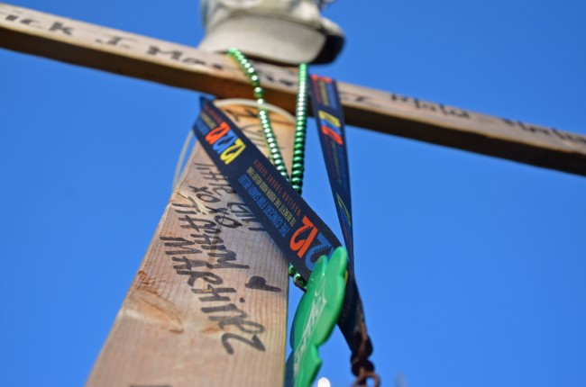 The roadside memorial on State Road 100 for Frederick Martinez bears his mementos from attending  a Hurricane Sandy relief concert. Click on the image for larger view. (© FlaglerLive)