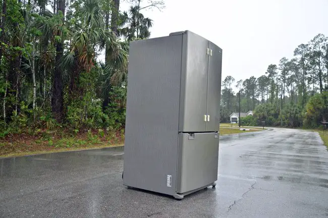Monday marked the 49th anniversary of the release of '2001: A Space Odyssey.' On Wednesday, the famous monolith returned, it seems, but in the form of a fridge, lost on a P-Section street in Palm Coast. It did not linger. (© FlaglerLive)