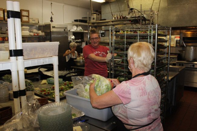 Preparations for last Sunday's Sheltering Tree fund-raiser. (The Sheltering Tree)