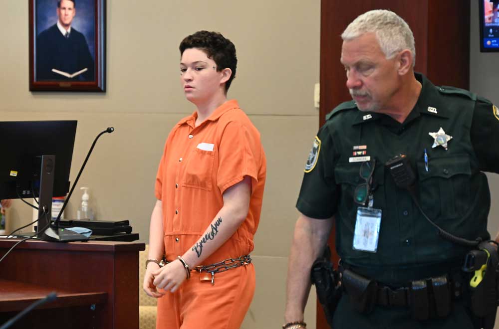 Gabriella Alo, left, in court at a bond hearing earlier this month. She was back in court today for another bond hearing, where the judge raised her bond to $33,500. (© FlaglerLive)
