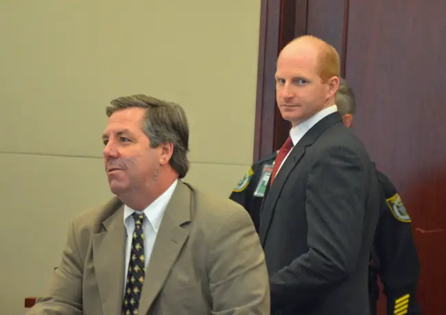 Grant Geiger, right, with his attorney, William Bookhammer, three hours before he heard the verdict against him. (© FlaglerLive)