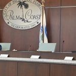 Palm Coast City Council member Charles Gambaro, right (seen here at a previous council meeting) called for an investigation of Mayor Norris over an allegation that he violated the city charter by demanding the resignation of top staffers. (© FlaglerLive)