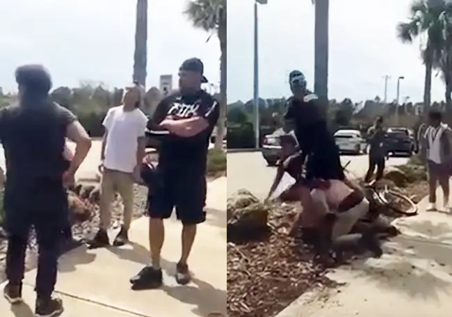 In the left video still, Anthony Gardiner is standing with his arms crossed moments before his son, in the white shirt, and the other Indian Trails Middle School student, in the dark shirt, begin to fight in front of him. In the second still, he appears to be pushing the boy in the dark shirt off his son. The videos, which were part of the Sheriff's investigation, are below.