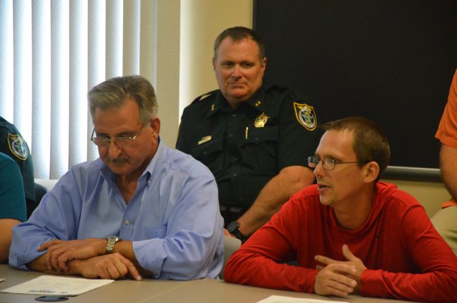 Former inmate Jason Gardner, who went through Stride, speaking of his experience today eith Pastor Charles Silano, left, and jail Director Steve Cole looking on. Click on the image for larger view. (© FlaglerLive)