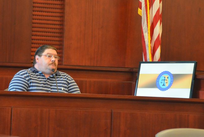 Gary Hodges testifying on his own behalf this morning. (c FlaglerLive)