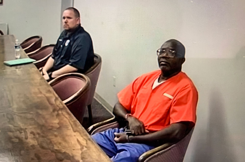 Louis Gaskin, right, who is to die by lethal injection on April 12, appeared by zoom from the state prison in Raiford for a court hearing in Bunnell before Circuit Judge Terence Perkins. (© FlaglerLive)