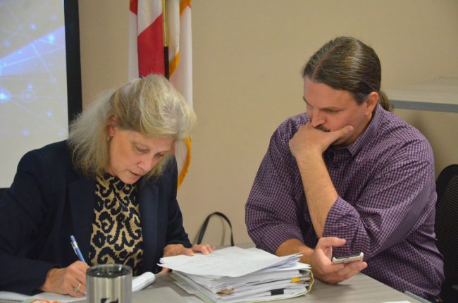 Then it was down to number-crunching between Sprouse and School Board Attorney Kristy Gavin. (© FlaglerLive)