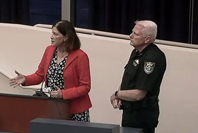 School Board attorney Kristy Gavin and Sheriff's Chief Mark Strobridge had negotiated the deal on behalf of their vrespective agencies, and presented the final contract to the school board this evening. (© FlaglerLive via Flagler TV)