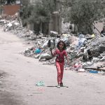 A Gaza girl in search of food. (Wikimedia Commons)