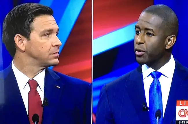 Ron DeSantis, left, and Andrew Gillum during Sunday's debate. (© FlaglerLive via CNN)