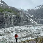 U.S. Geological Survey staff check monitoring equipment in Suicide Basin in June 2025. By August, the basin had filled with meltwater. Jeff Conaway/U.S. Geological Survey