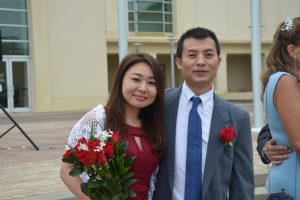 Mr. Ming Gong and Mrs. Sujeong Wan, moments after their wedding vows. The Palm Coast residents are originally from China. Click on the image for larger view. (© FlaglerLive)