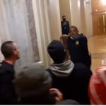 A still from a video obtained by ProPublica showing a mob confronting Capitol Police Officer Eugene Goodman on Jan. 6. (Via ProPublica video/Parler)