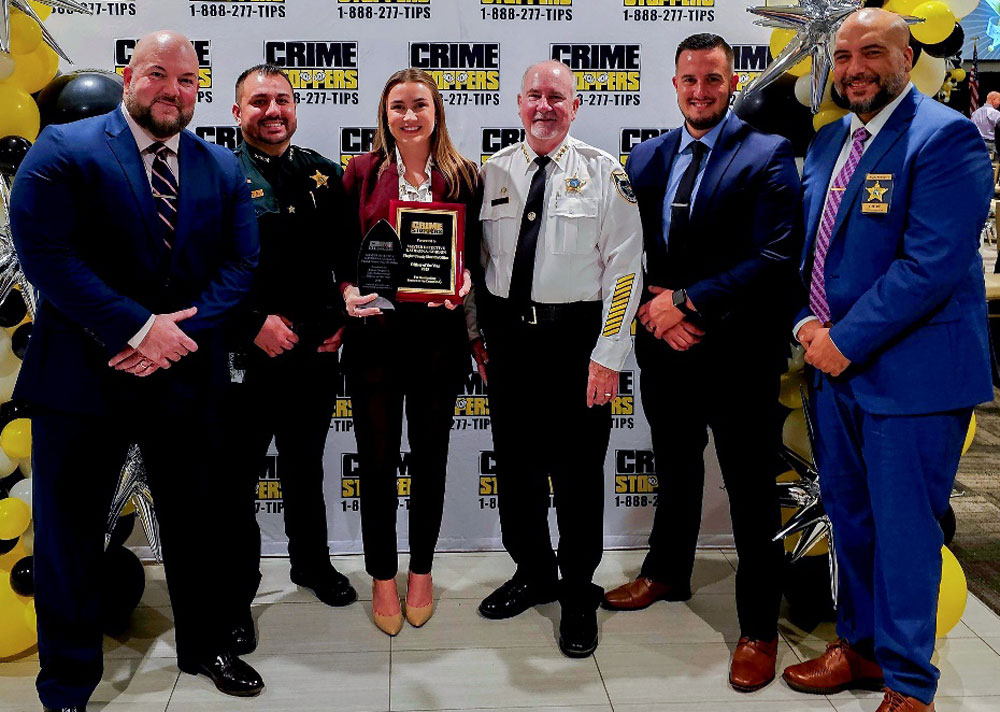 Detective Sergeant George Hristakopoulos, Chief Deputy Joe Barile, Master Detective Kathryn Gordon, Sheriff Rick Staly, Commander Brian Finn, and Chief Agustin Rodriguez attend the Crime Stoppers 25th Annual Banquet Honoring Local Law Enforcement held Thursday, Sept. 4, 2025, in Daytona Beach, Fla. At the banquet, Master Detective Gordon was named 2025 Officer of the year. (CrimeStoppers)