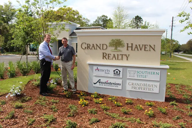 Jim Cullis & Lindsay Dolamore at the new Grand Haven Realty Real Estate Center.