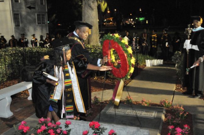 The service of consecration closed with the traditional Candlelight Wreath Laying Ceremony in front of the burial site of Dr. Mary McLeod Bethune. Doing the honors: the 65th Miss B-CU Jacqualyn Townsend, and Interim President Hubert Grimes. (BCU)