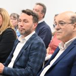 County Attorney Al Hadeed in the foreground, with Assistant County Attorney Sean Moylan and County Administrator Heidi Petito to his right, at a recent meeting in Marineland. (© FlaglerLive)