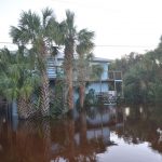 A flooded property in the Hammock in 2016, in the aftermath of Hurricane Matthew, whose effects were limited to tropical storm conditions onshore. (© FlaglerLive)