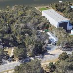 The Hammock Harbour property to the right of the water tower used to be a boat-manufacturing site. A1A is in the foreground. (Google Earth)
