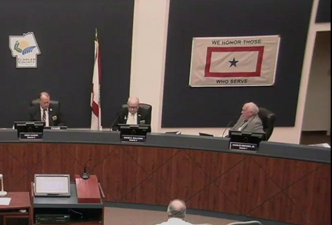 From left, County Commissioners Greg Hansen, Dave Sullivan and Charlie Ericksen Monday morning voted to ban medical marijuana dispensaries in unincorporated Flagler County. (© FlaglerLive via Flagler County TV)