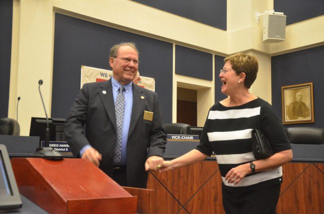 Greg and Linda Hansen at Greg's swearing in in 2017. (© FlaglerLive)