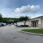 The shooting Saturday took place at 5F, in the garage to the right, in the sprawl of hangar-like businesses at Hargrove Lane in Palm Coast. (© FlaglerLive)