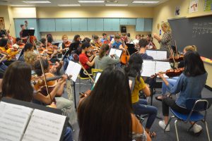 The Harmony Chamber Orchestra in rehearsal Wednesday at Indian Trails Middle School. Click on the image for larger view. (© FlaglerLive)