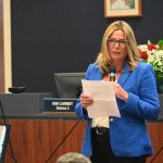 County Administrator Heidi Petito speaking at former County Attorney Al Hadeed's retirement celebration last July. (© FlaglerLive)