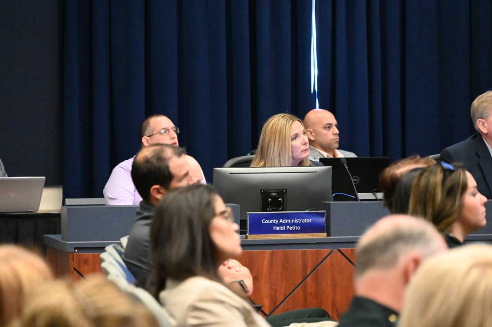 County Administrator Heidi Petito was left to deciphering county commissioners' latest haze of directions at this morning's special workshop and meeting on a "blown up" budget, as Commissioner Andy Dance described it. (© FlaglerLive)