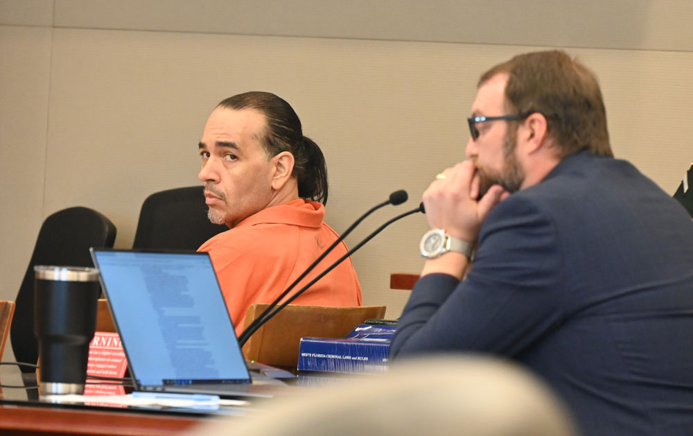 Kristopher Henriqson in court today. His attorney, Spencer O'Neal, is to the right.