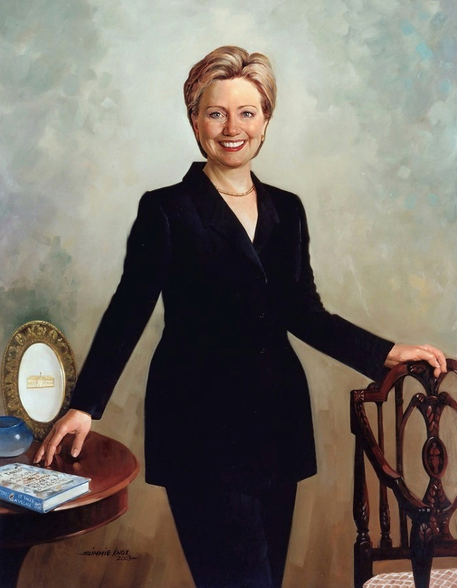 That strange painting, an oddly youthful, seemingly carefree and graduate-student-like rendition of Hillary Clinton, is actually the official White House portrait of the former secretary of state and First Lady, by Simmie Knox. 