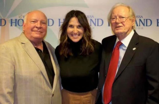 Milissa Holland with Jon Netts and Jim Canfield, the three Palm Coast mayors. 