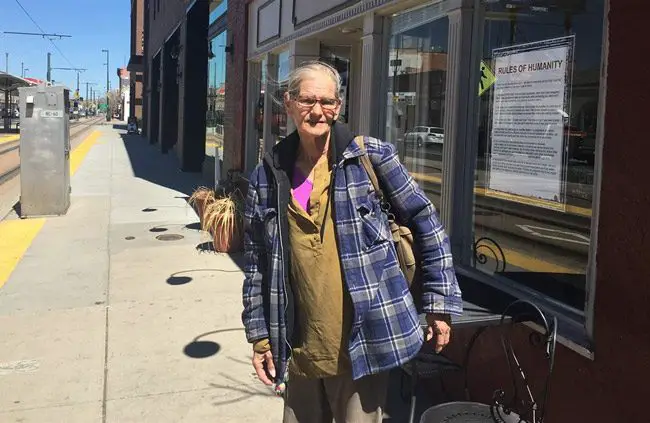 Debbie Hyatt stands outside the Impact Humanity store in downtown Denver. She sleeps in a shelter now but for a time slept on the sidewalk. (Pew Charitable Trust)