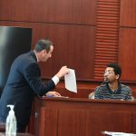 D’Shawn Hosang, on the stand, scuttled Assistant State Attorney Jason Lewis's attempt to "refresh" his memory about the night of the murder, when Hosang had previously claimed that a serious argument with Deon Jenkins had angered Marcus Chamblin, who is accused of killing Jenkins. (© FlaglerLive)