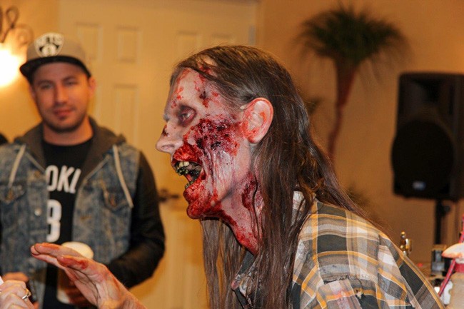 Make-up expert Laura Tyler put on a show as she transformed Timber Weller into a zombie during the Flagler Film Festival last weekend at the Hilton Garden Inn in Palm Coast. (© FlaglerLive)