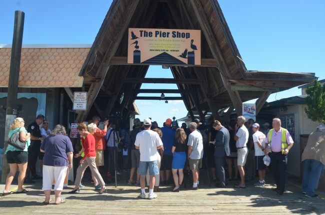 Media and officials huddled around Sen. Bill Nelson for 45 minutes at the pier this morning. 