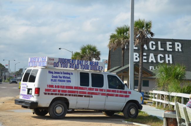 Parked by the Flagler Beach pier Friday: 'I make well-being and create calamity,' God says in Isaiah (45:7), so you know who to blame for Hurricane Irma. (© FlaglerLive)