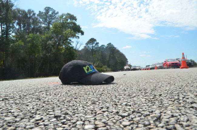 The biker was wearing a cap commemorating Hurricane Sandy relief. Click on the image for larger view. (© FlaglerLive)